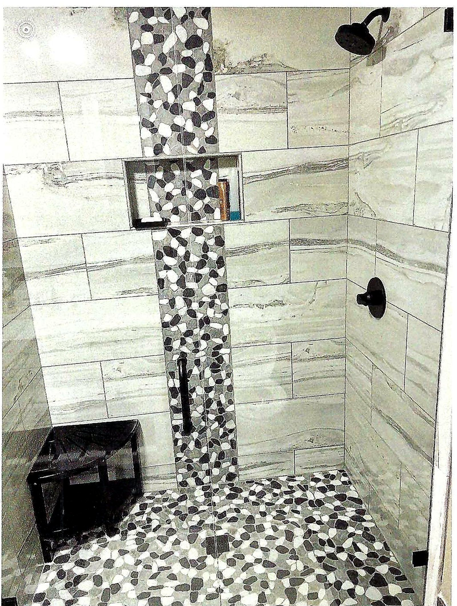Pebble tile shower by Kyle the Tile Guy