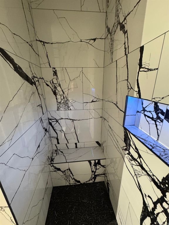 Luxury porcelain-style shower by Kyle the Tile Guy